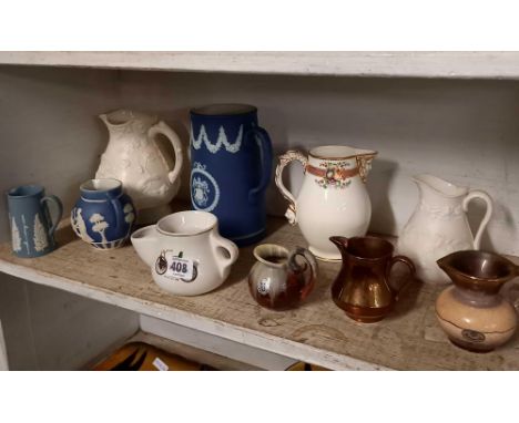 SHELF OF VARIOUS VINTAGE JUGS