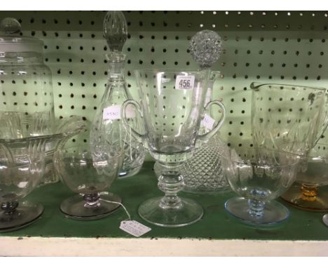 SHELF OF VARIOUS DECANTERS, VASES,GOBLETS, SUNDAE DISHES ETC