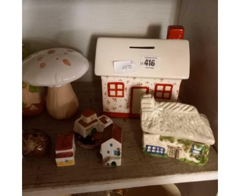 SHELF OF POTTERY ORNAMENTS, MONEY BOXES ETC