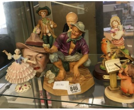 SHELF OF FIGURINES INCL; CHURCHILL WITH CIGAR A/F, A ROYAL DOULTON THE BEACH COMBER HN2487 &amp; OTHER FIGURES