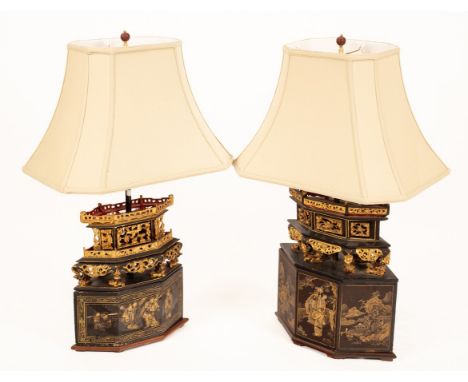 Two Chinese carved and lacquered lamp bases with cream shaped shades, each 90cm high (including shade)   CONDITION REPORT:  T
