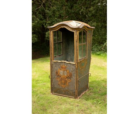 An Avignon sedan chair, possibly by Guignet, circa 1750: painted in an elegant grey flowered arabesque design, lined with gre