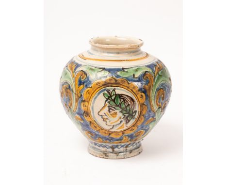 An Italian polychrome maiolica globular vase, 19th Century, in the style of Caltagirone, with a portrait medallion of a male 