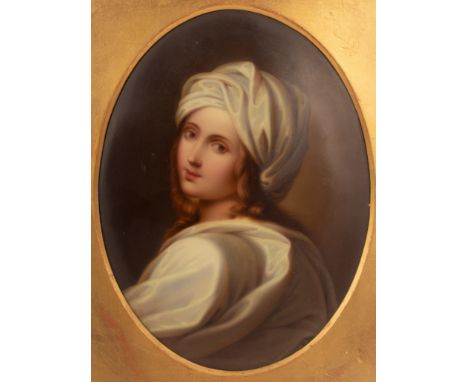 An oval porcelain plaque after Guido Reni depicting a portrait of Beatrice Cenci, approximately 19cm long, within a gilt fram
