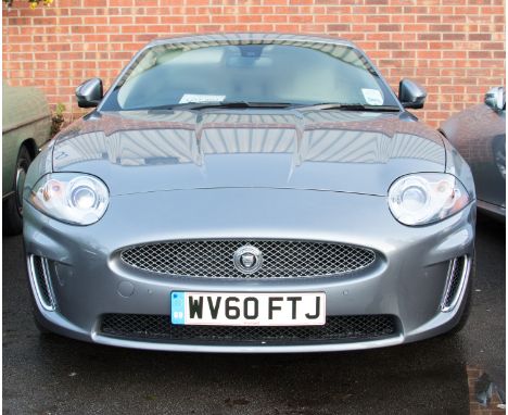 A grey Jaguar XK QQ6 coupe sports car, 2010, odometer reading on 28th July 184 miles,  Registration No. WV60 FTJ, XK Auto mod