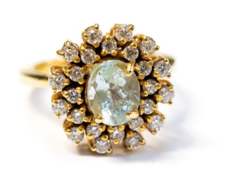 An aquamarine and diamond flower head cluster ring, the centre oval aquamarine approx 8.5mm x 6.5mm double surround of small 