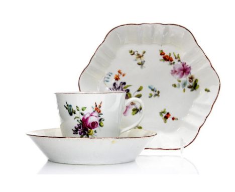 A Derby porcelain cup, saucer and teapot stand, the cup and saucer of conical form, decorated with roses and floral sprays, t