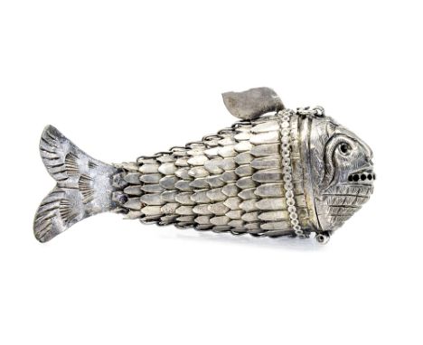 A white metal model of an articulated miniature fish, hinged and pierced head, length 6cm