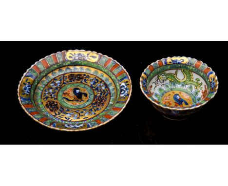 A Chinese famille verte tea bowl and saucer, Kangxi mark and probably of the period, circa 1710