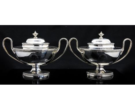 A pair of George III silver sauce tureens and covers, Neoclassical boat form with reeded loop handles and beaded borders, the