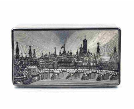 An Imperial Russian silver and niello enamelled box, the lid decorated with a view of the Kremlin, Moscow, with bridge in the