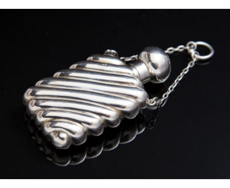 A Victorian silver gadrooned scent bottle on suspension chain, maker's mark rubbed, Birmingham 1888, approximate weight 0.82o