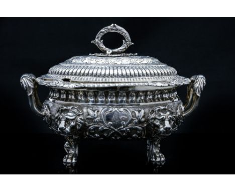 A George III silver sauce tureen and cover, of oval bombe form, gilt interior, scroll handle, the whole bright cut engraved a