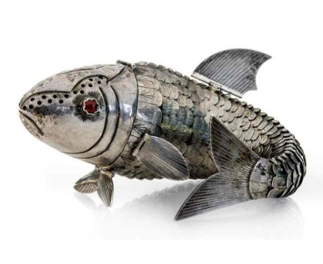 A white metal model of an articulated fish, hinged fins, pierced head with red glass eyes, struck No.8302, length 18cm 