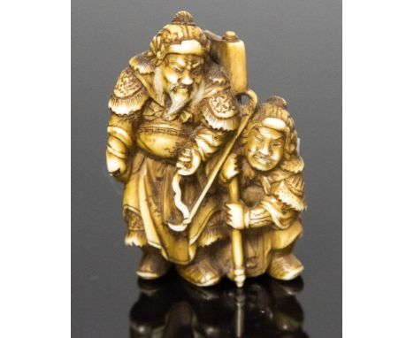 An Oriental ivory netsuke, carved as two warriors, signed, height 3.5cm