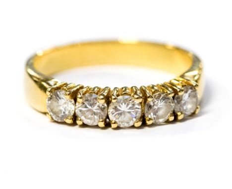 A diamond five stone ring, round brilliant cut diamonds weighing a total of 1.00 carat yellow gold, claw settings and shank, 