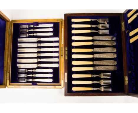 An Edwardian silver canteen of fruit knives and forks, bright cut blades, mother of pearl handles, maker William Hutton, Lond