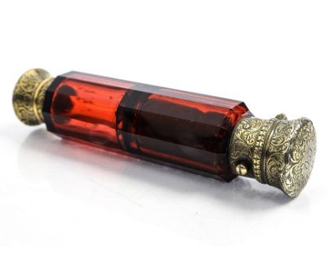 Sampson Mordan, a Victorian ruby glass double ended scent bottle, silver gilt bright cut scroll engraved mounts, maker Sampso