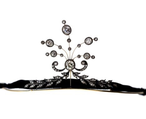 A Victorian diamond yellow gold tiara, the garland style tiara containing nineteen round old cut diamonds, the leaf and scrol