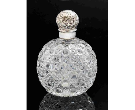 A Victorian large clear hobnail cut glass scent bottle, the silver repousse screw top maker Sampson Mordan & Co, London 1892,