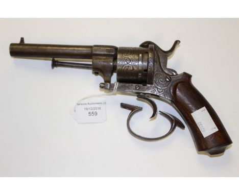 A 9mm antique pin-fire revolver bearing Liege proof marks with a machine engraved frame and cylinder, the loading gate is mis
