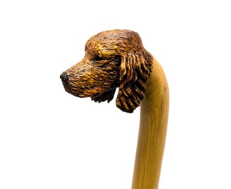 An Ian Taylor walking stick, handle in the form of a Cocker Spaniel's head, with certificate.  This is one of three existing 