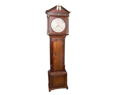 A George III oak and mahogany eight day longcase clock, by Torkington of Newcastle, the hood having a broken pediment and a b