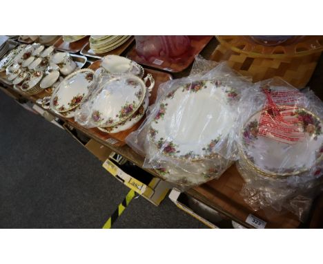 Four trays of Royal Albert 'Old Country Roses' design tea and dinnerware items, many appearing in original packaging to inclu
