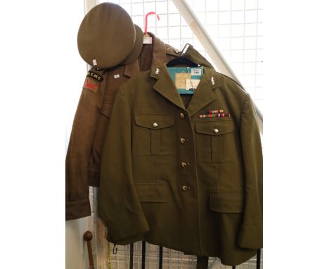 British military army officer's no. 2 dress jacket and trousers with RAOC buttons and matching cap. Together with a box of ot