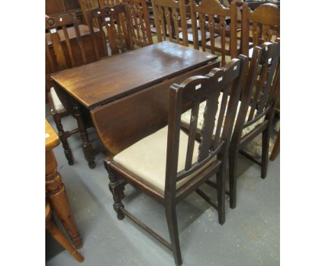 Mid 20th Century oak gate leg table, together with a pair of four matching mid 20th Century oak slat back dining chairs. (5)(