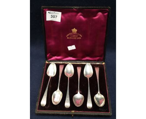 Cased set of Georgian bright cut silver teaspoons. London hallmarks with initial R to the terminal, marks rubbed. 2.4 troy oz