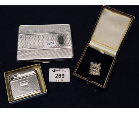 Ronson Cadet cigarette lighter in original box, plated engine turned cigarette case and a silver and enamel Oriel pin badge w
