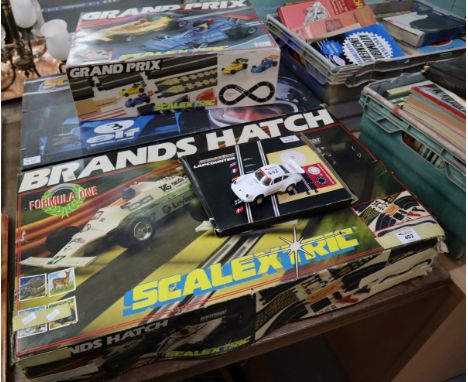 A collection of Scalextric to include; Brands Hatch C698 Grand Prix racing set, lap counter etc. (B.P. 24% incl. VAT)Conditio
