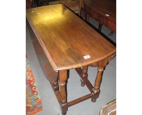 20th Century oak gate legged table. (B.P. 24% incl. VAT) 