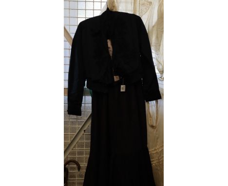 Victorian ladies outfit to include; a long tiered silk underskirt, a silk blouse with crochet detail and shell buttons, a bla