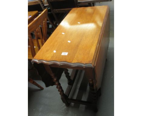 Early 20th Century oak gate legged table with piecrust edges and barley twist supports. (B.P. 24% incl. VAT) 