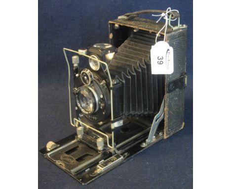 A Compur folding reprographic plate camera with leather case and wallet of dark slides. (3)(B.P. 24% incl. VAT) 