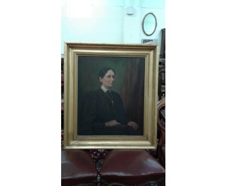portrait of a lady seated in three quarter pose, oil on canvas, signed, in a heavy gilt frame, 56 x 66 cm