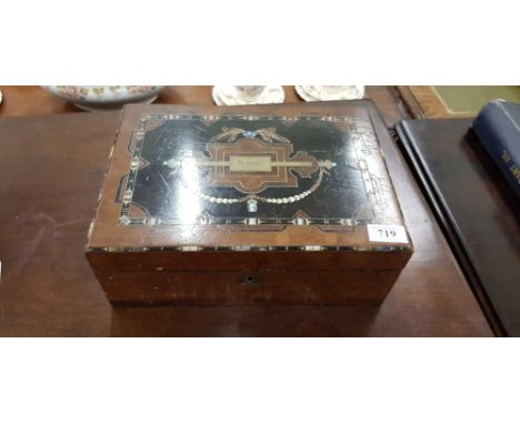 of rectangular form with ebonised and mother of pearl decoration