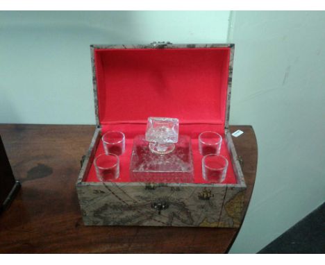 comprising of four tot glasses and a square decanter in a fitted case