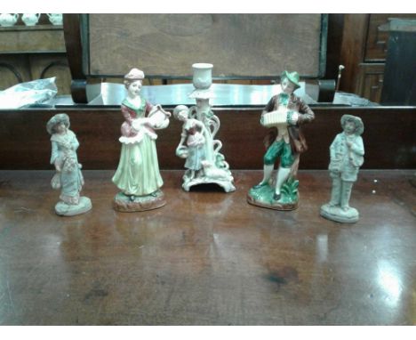including two pairs of musicians and a figural candlestick (5)