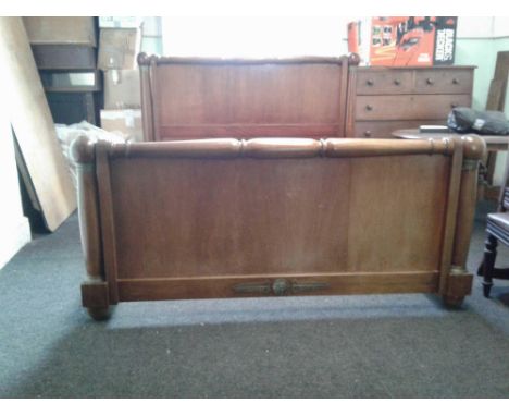 the heavy panel ends supported by turned columns, 183 cm wide