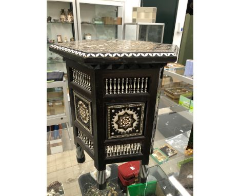 A FINE ANTIQUE EUROPEAN MOORISH STYLE EBONY OCCASIONAL TABLE WITH IVORY TORTOISESHELL MOTHER OF PEARL INLAYS LABELLED TO UNDE