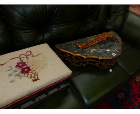 A DEMILUNE CONSOLE TABLE WITH SIMULATED MARBLE TOP AND ON A GILT METAL FOLIATE LEG TOGETHER WITH A VICTORIAN FOOT STOOL