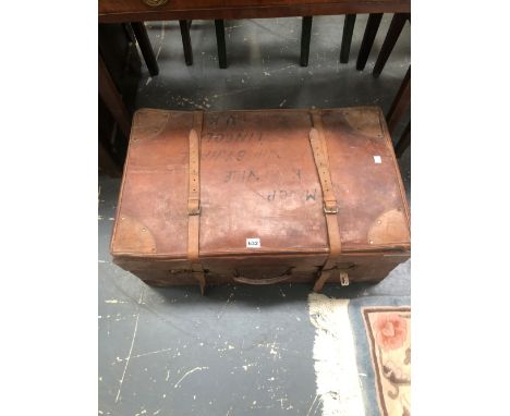 A LEATHER TRUNK.   W 71 x D 43cms