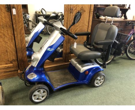 A KYMCO MOBILITY SCOOTER.