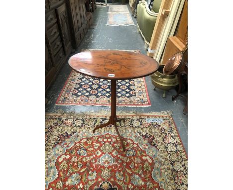 A 19th C. PAINTED SATIN WOOD TILT TOP TRIPOD TABLE, THE CROSS BANDED OVAL TOP WITH A MUSICAL TROPHY CENTRAL TO FLORAL SWAGS, 