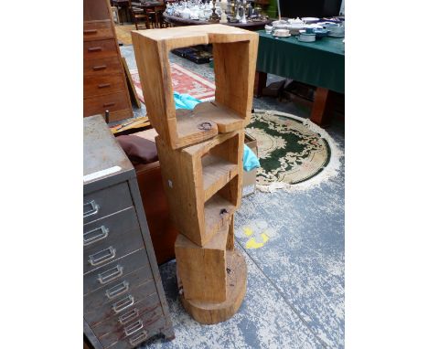 A MODERN RUSTIC SET OF FOUR SHELVES CUT SQUARE FROM TREE TRUNK SECTIONS.   H 126cms.