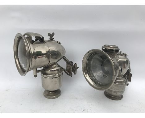 A Herm.Riemann nickel plated acetylene headlamp and one other, a Lucas Lustra, no. 256.