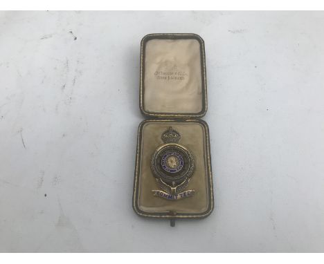 A rare silver gilt and blue enamel RAC Committee Member's lapel badge in original case, marked Elkington and Co. Court Jewell